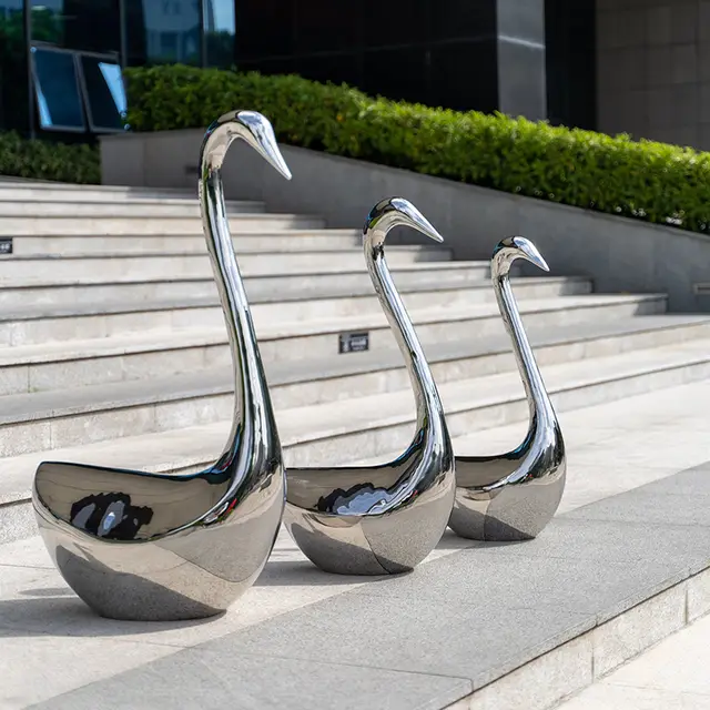 Outdoor garden grass courtyard home decoration stainless steel swan sculpture seen from another angle