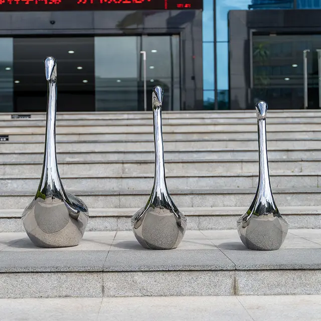 Outdoor garden grass courtyard home decoration stainless steel swan sculpture in close view