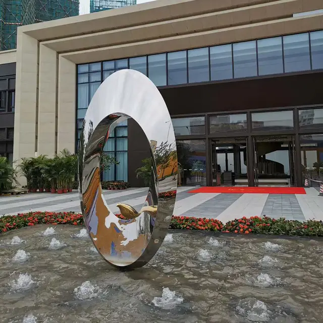 Outdoor garden park pool metal sculpture stainless steel abstract sphere sculpture seen from another angle