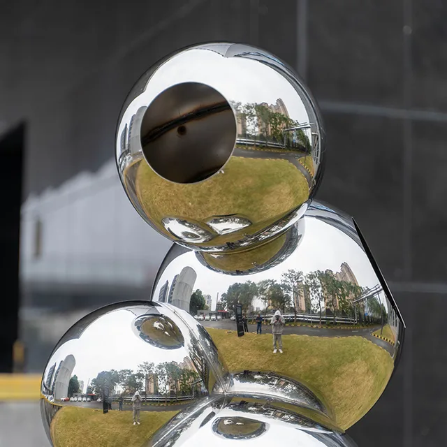 Outdoor garden Stainless steel sphere sculpture in close view