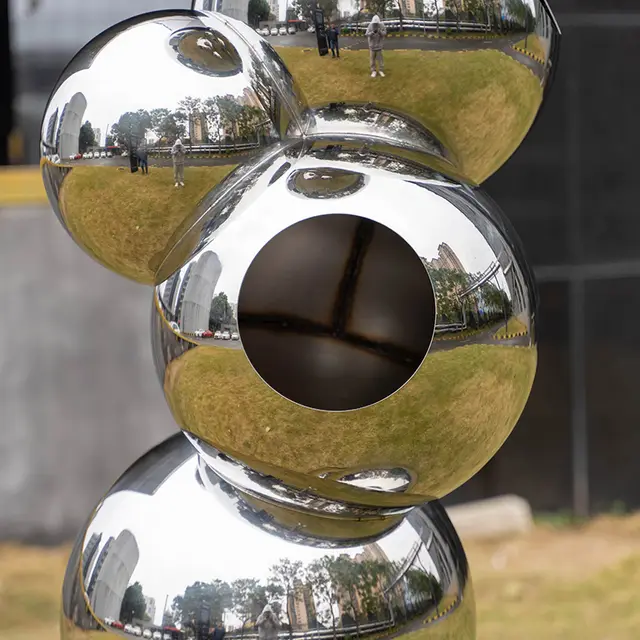 Outdoor garden Stainless steel sphere sculpture from the side