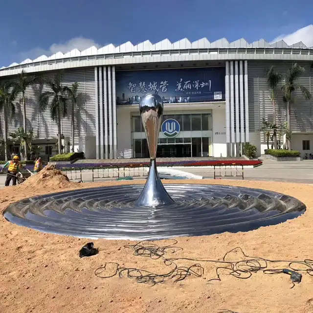 Outdoor plaza garden lawn park metal sculpture stainless steel abstract ripple sculpture seen from another angle