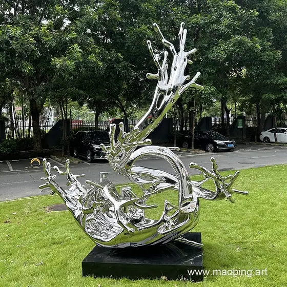 Outdoor square apartment art deco stainless steel spray sculpture
