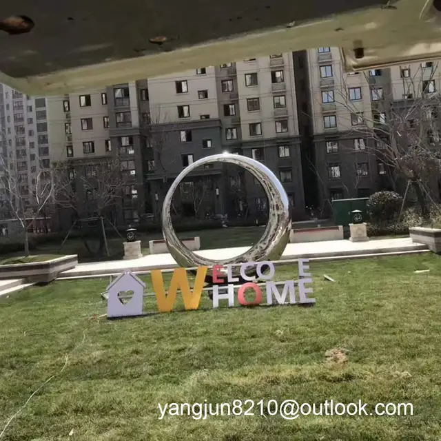 Outdoor square beach landscape sculpture design stainless steel ring sculpture in close view