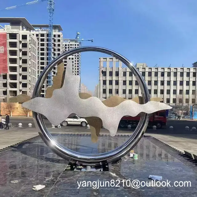 Outdoor square beach landscape sculpture design stainless steel ring sculpture seen from another angle