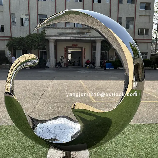 Outdoor square garden courtyard luminous stainless steel crescent sculpture from the side