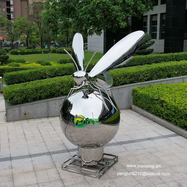 Outdoor square park beach amusement park library school airport art mirror polished stainless steel bee sculpture seen f