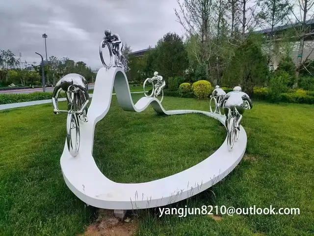 Outdoor square park playground museum architectural landscape artwork stainless steel bicycle sculpture in close view