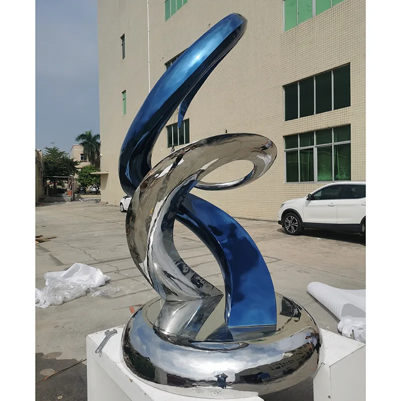 Stainless steel abstract sculpture of large outdoor square