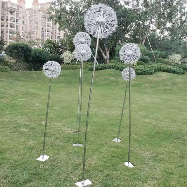 Large outdoor square park beach amusement park stainless steel dandelion sculpture in close view