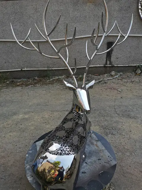 Outdoor park square garden metal decoration art hollowed-out stainless steel deer sculpture seen from another angle