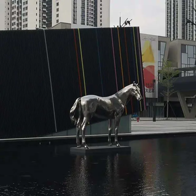 High gloss life size horses moulding statue outdoor animal Stainless steel sculptures shown in its setting