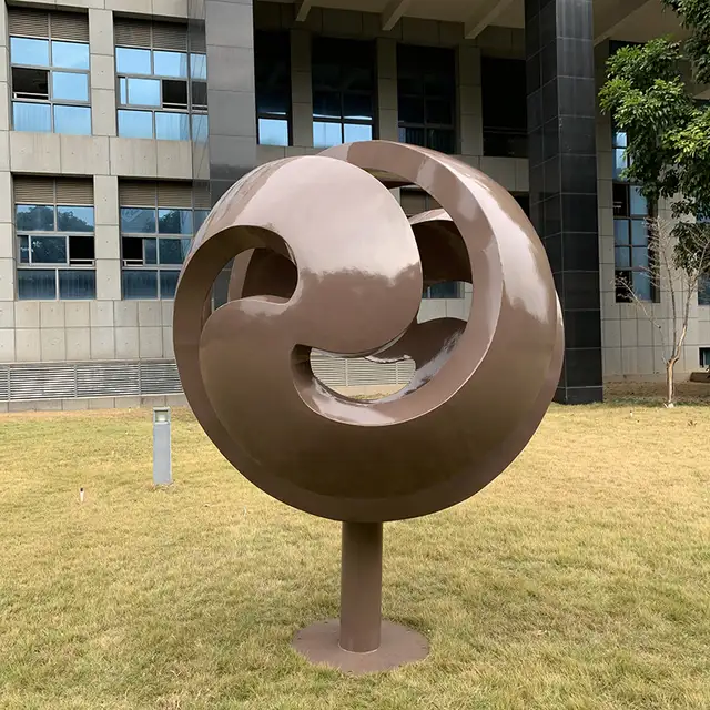 Swirling Painted Stainless Steel Sphere Sculpture in Toronto