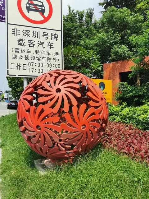 Large metal sphere Outdoor Decor Stainless Steel Sculpture Sphere Hollowed-out sphere in close view