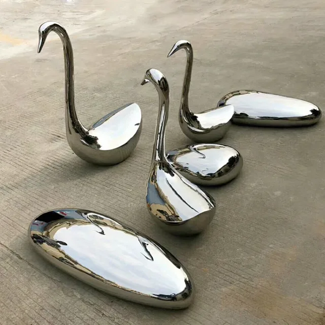 Large stainless steel sculpture—Swan in close view