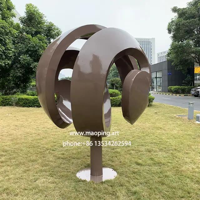 Swirling Painted Stainless Steel Sphere Sculpture in Toronto in close view