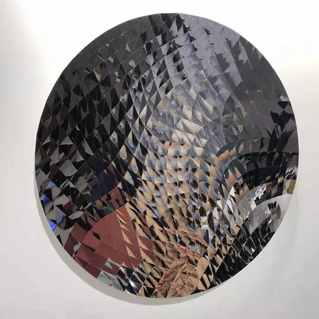 Concave Mirror Sculpture at the Metropolitan Museum of Art–Triangle Scale armour concave mirror seen from another angle