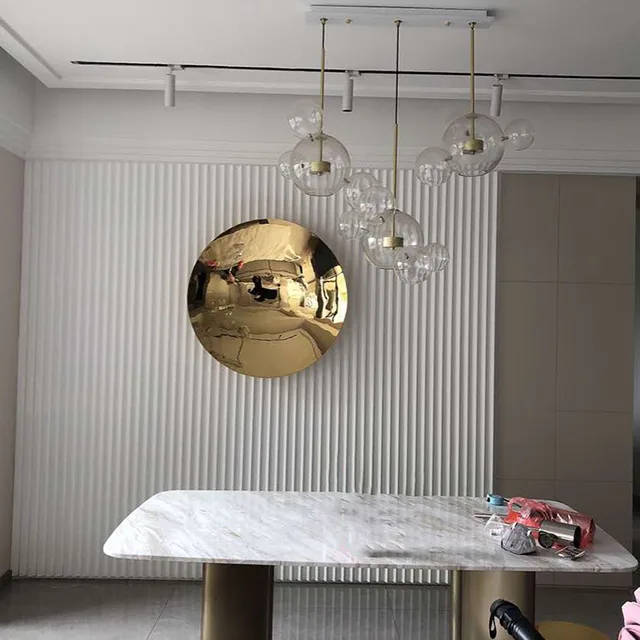 48″Home Decoration Metal circular concave mirror Stainless Steel Wall Sculpture shown in its setting