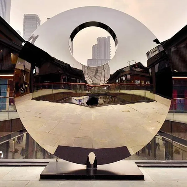 Large stainless steel sculpture—The Eye of God from the side