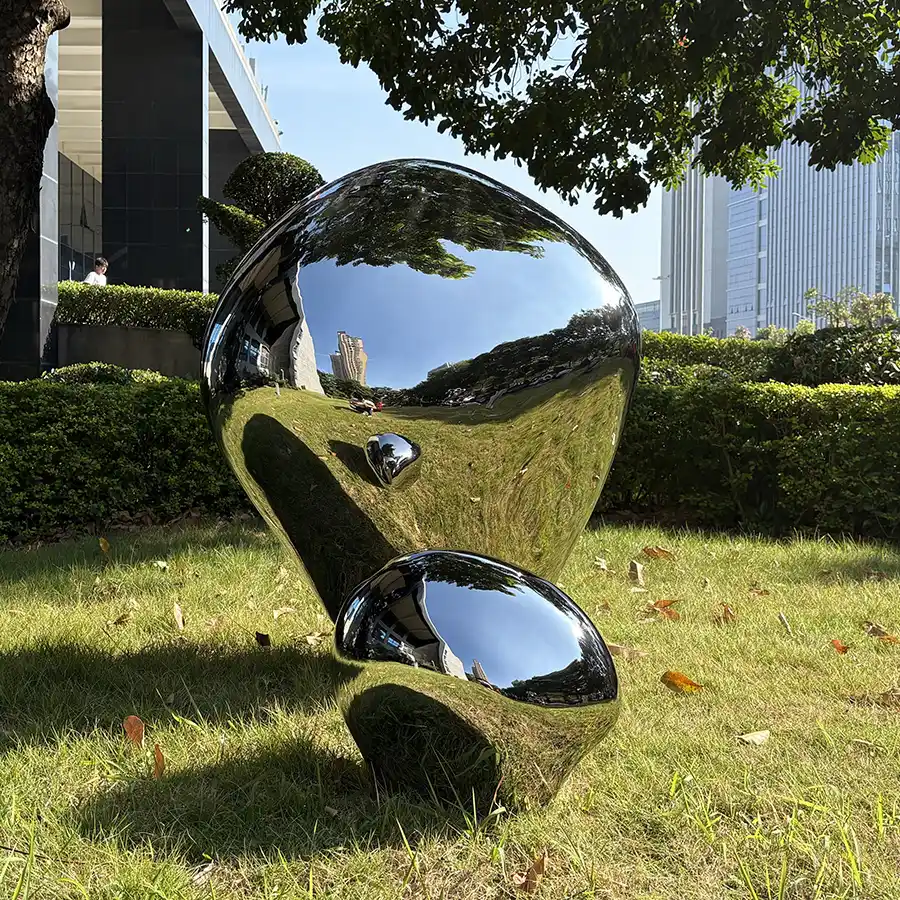 Mirror-Polished Stainless Steel River Stone Sculptures for Outdoor Landscapes
