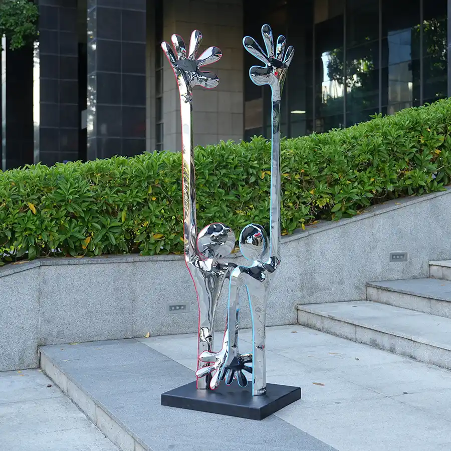 Modern Stainless Steel Figure Sculpture with Raised Arms for Interior Decoration