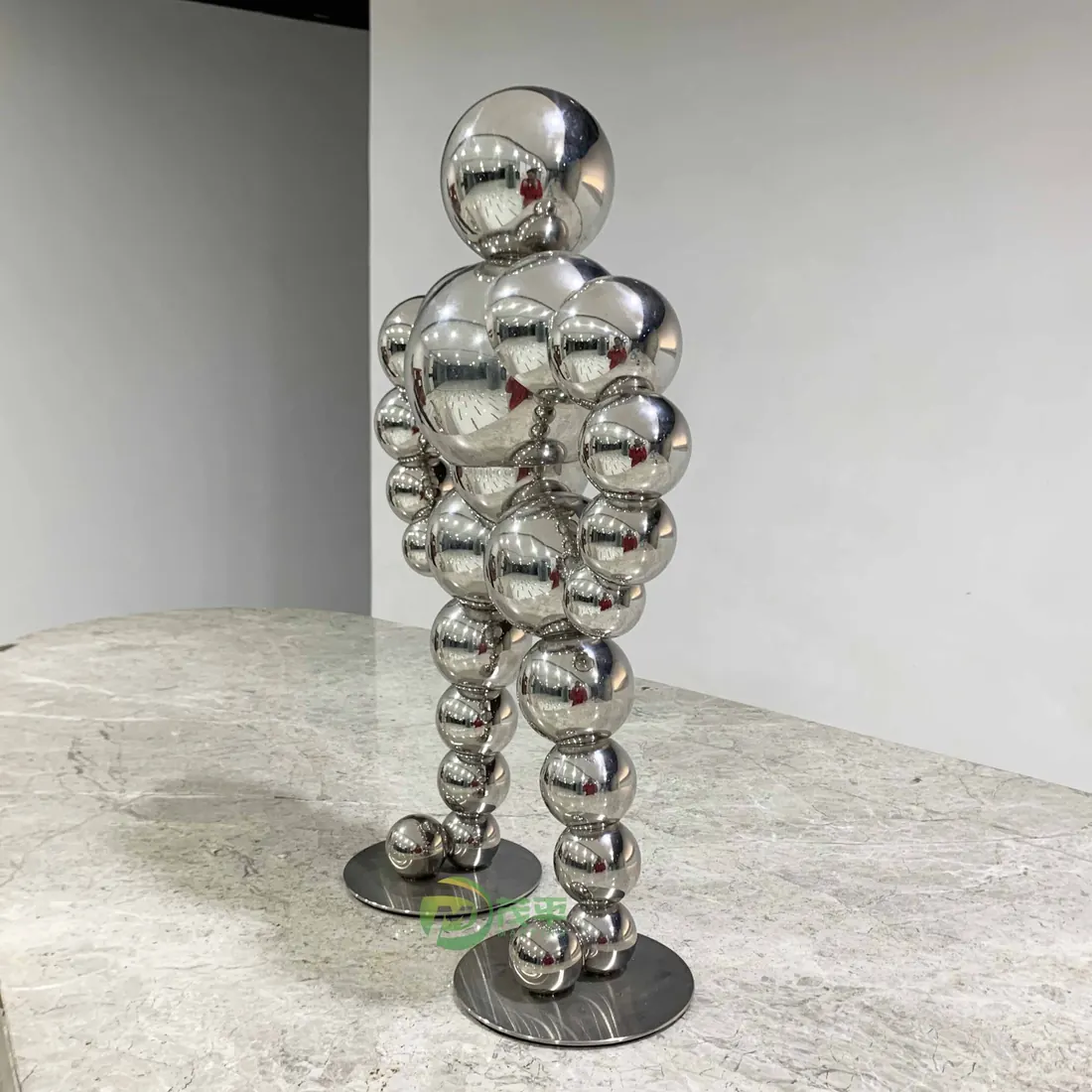 Ball man stainless steel sculpture