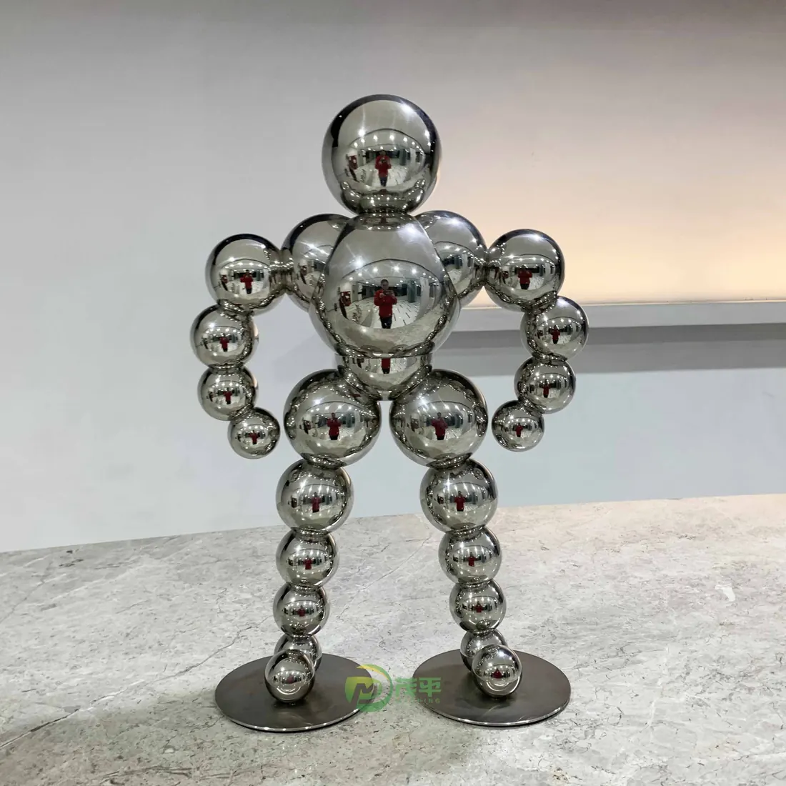 Ball man stainless steel sculpture