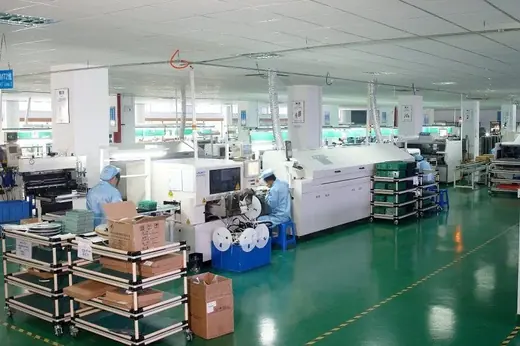 SMT auto line placing LED lamps and driver components onto the module PCBs