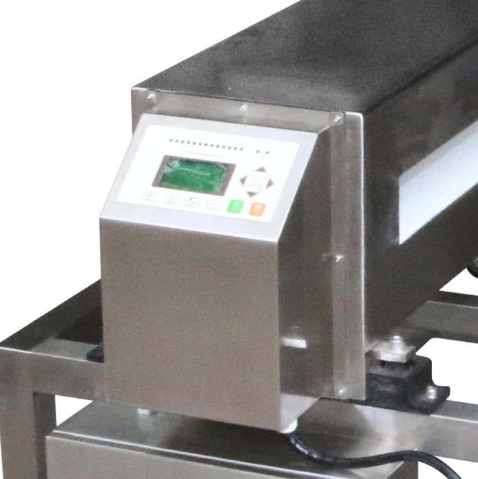 Rectangular conveyor metal detector head on a belt