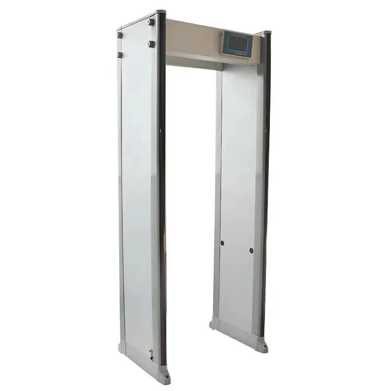 Airport walk through metal detector and handheld wand at a checkpoint