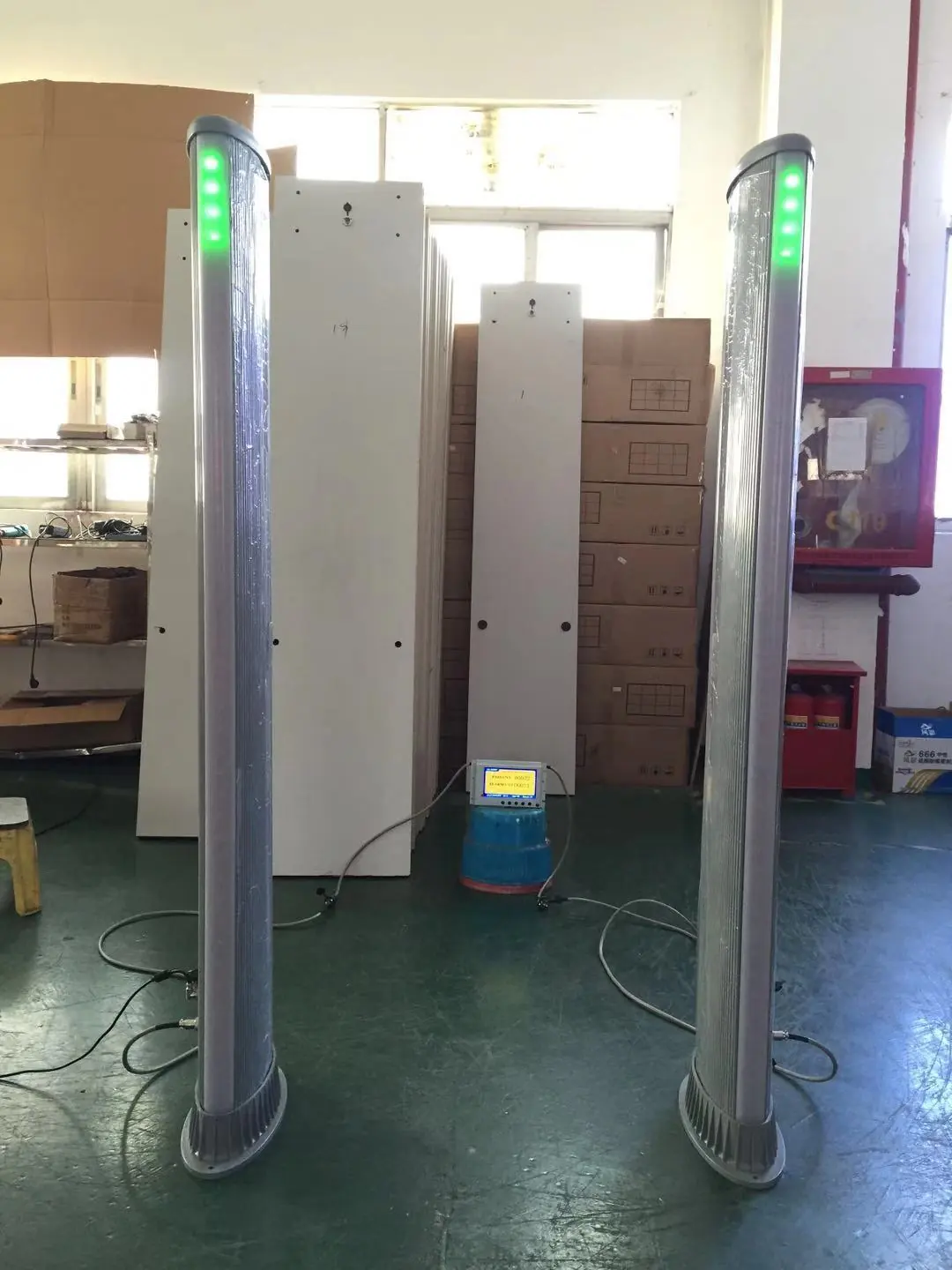 Single-panel detectors installed at a building entrance.