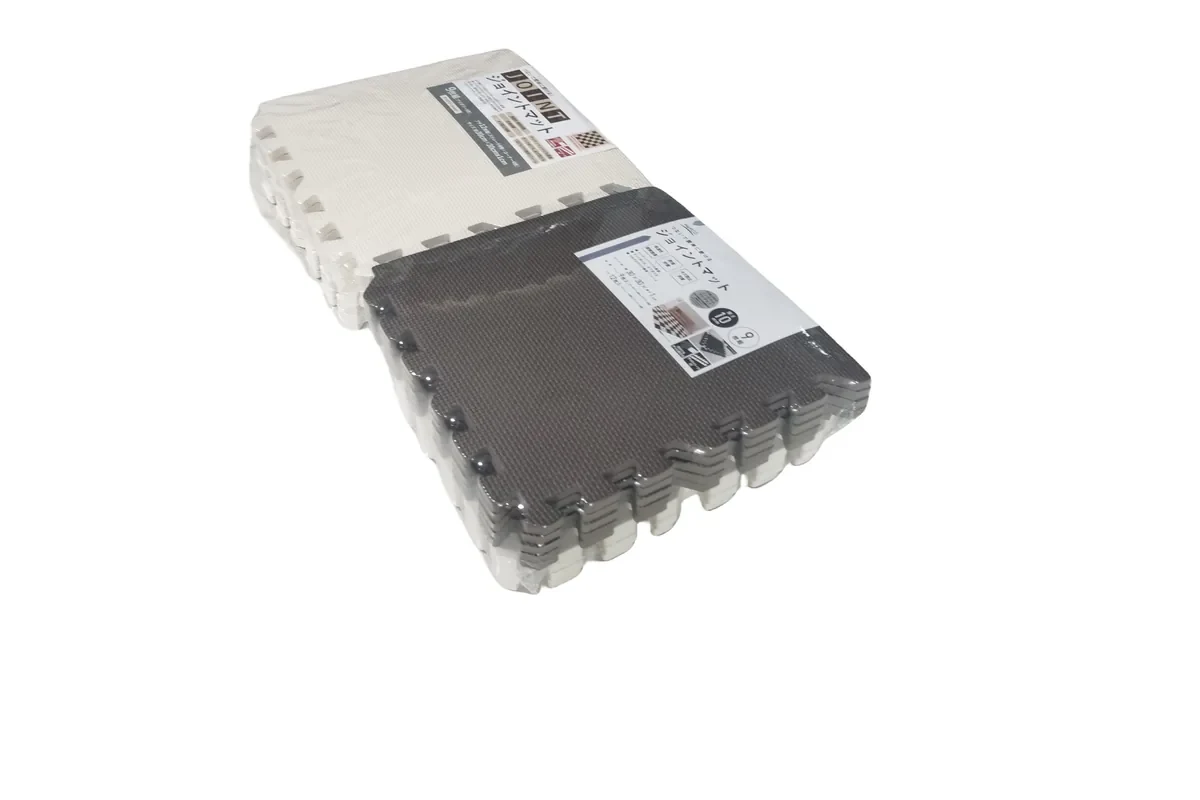 Shrink-wrapped EVA foam mats packed for export