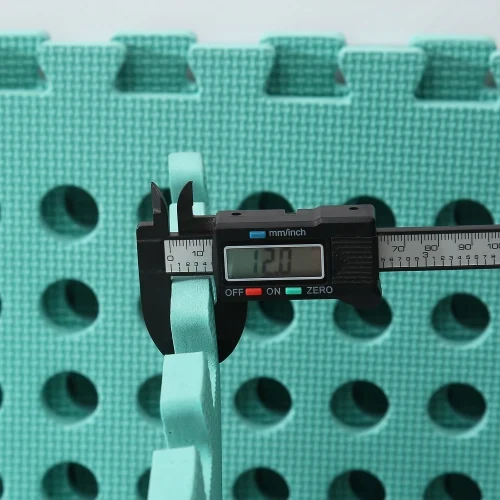 Swimming pool grid mat laid around a pool edge