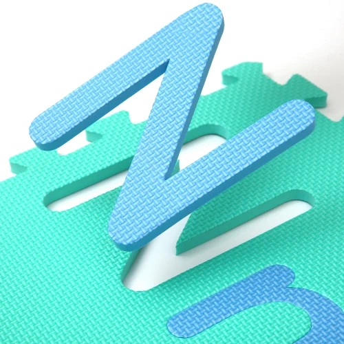 Waterproof baby play mat laid on a floor