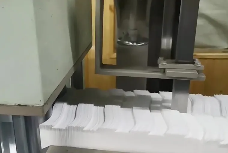 Folding and cutting machine assembled and ready for run-off on customer material.