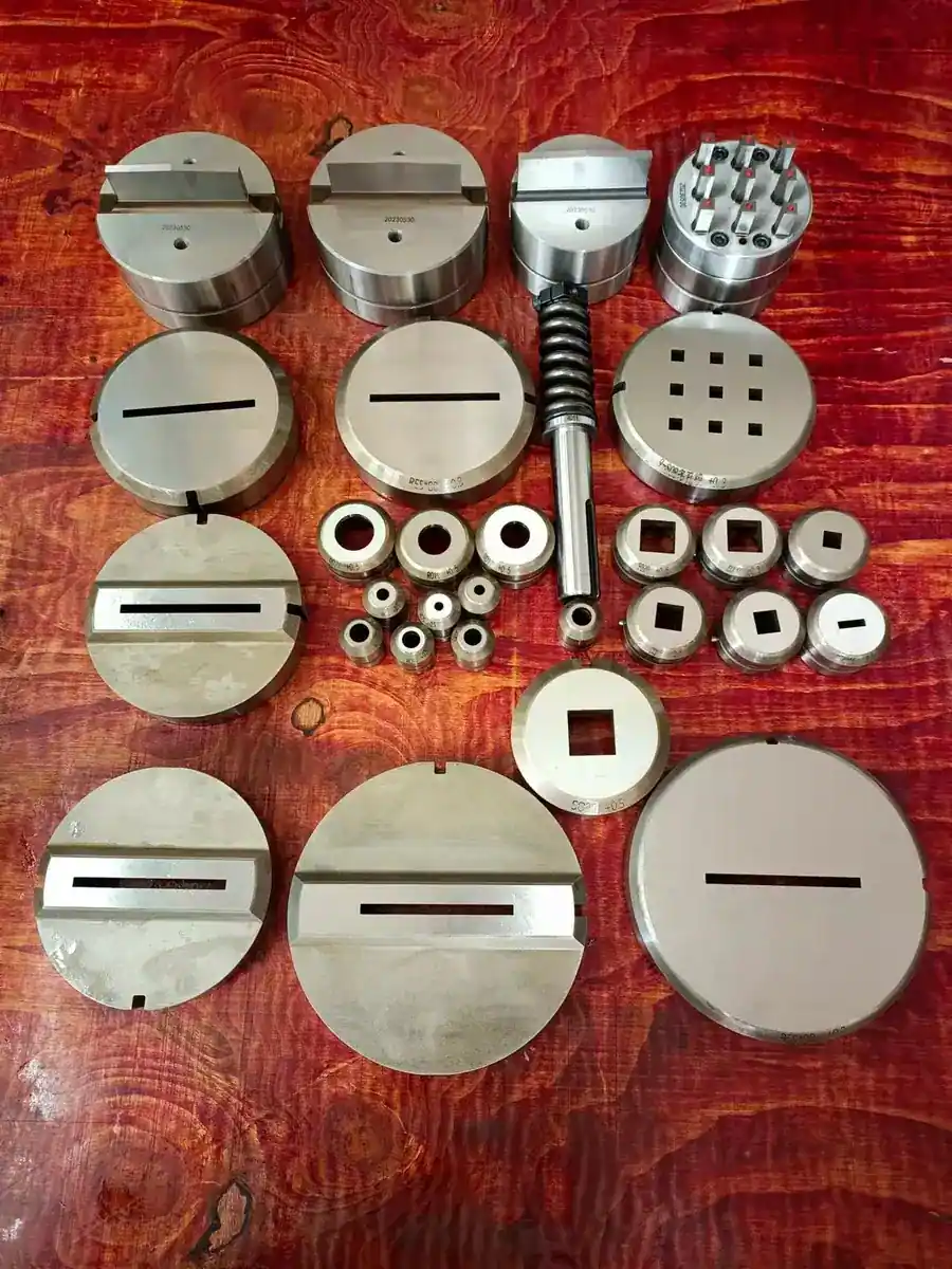 Precision machined CNC puncher die and punch tooling components with polished cutting faces