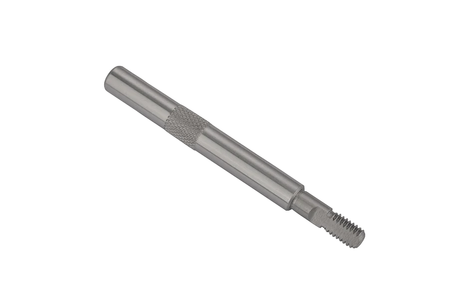Stepped alloy steel shaft with fine straight knurling and precision ground bearing journals