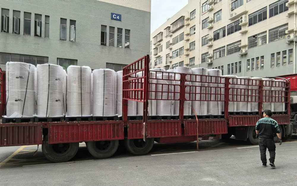 Truck loading finished label and paper cartons for export shipment