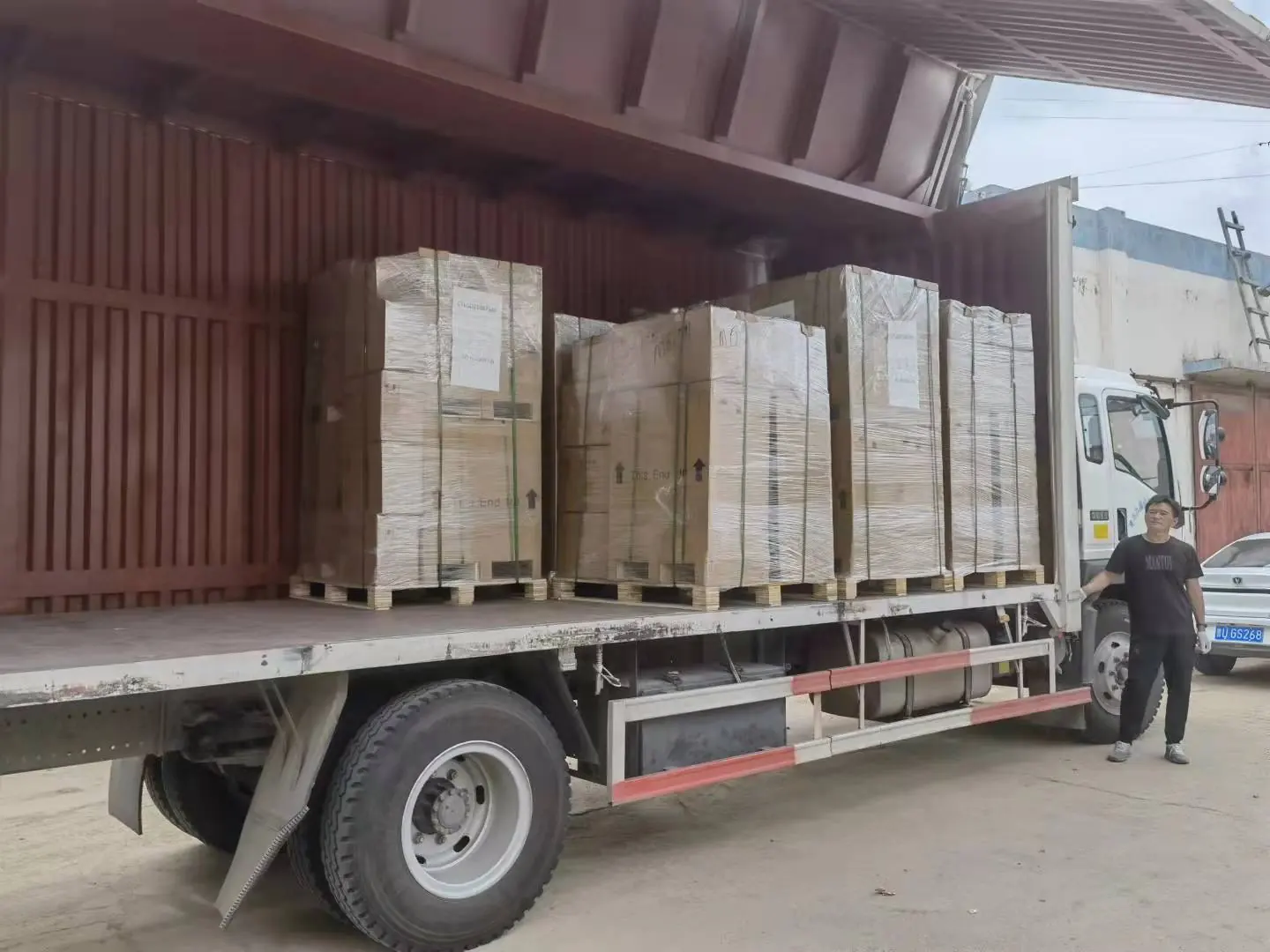 Export crates being loaded for shipment from the Nuodean factory
