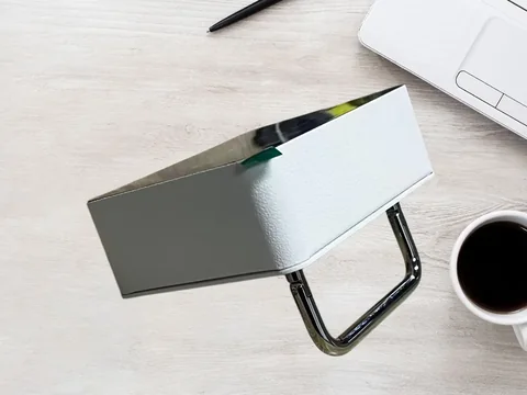 Handheld controller with its folding stand extended