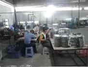 In-process sorting of finished castings, batched on the bench for inspection and packing.