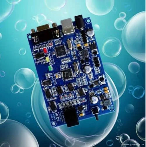 Compact assembled control PCBA on blue solder mask with shielded sections and a connector bank