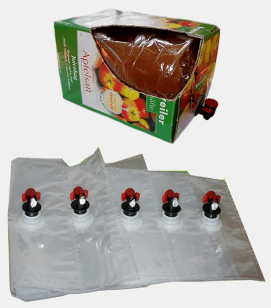 Bag-in-box apple juice carton above five transparent dispenser bags with red taps
