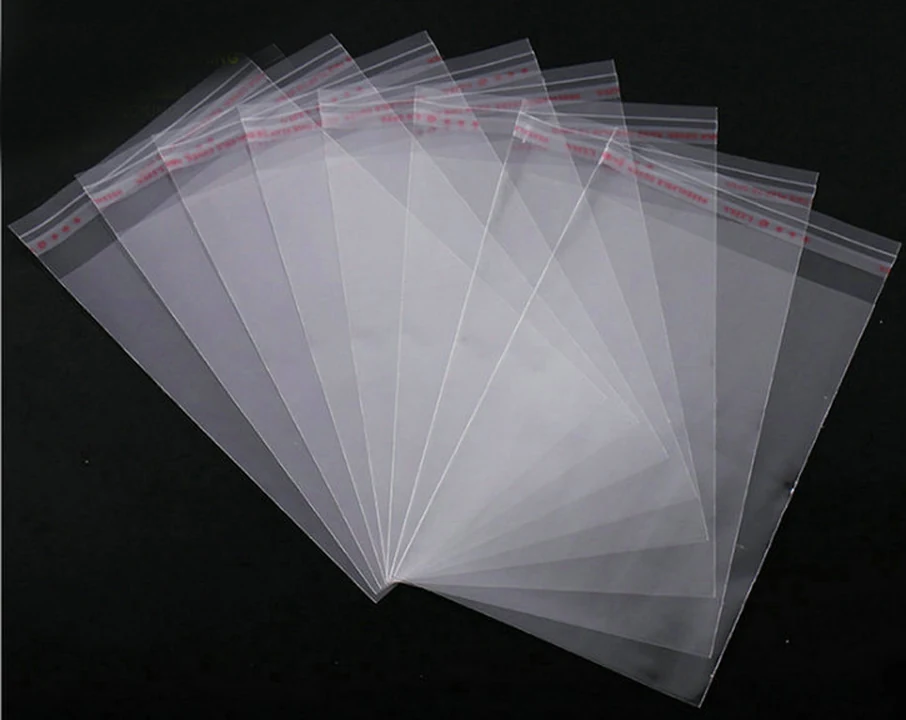 Clear plastic resealable bags fanned out on black background