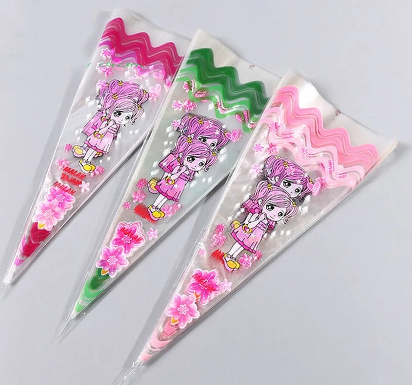 Three clear cone bags printed with cartoon girl in pink kimono and flowers