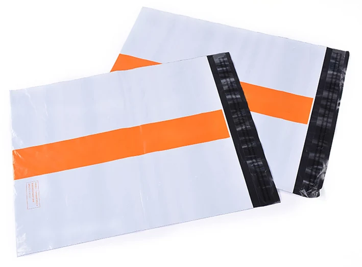 Two white poly mailer bags with orange stripe on white background