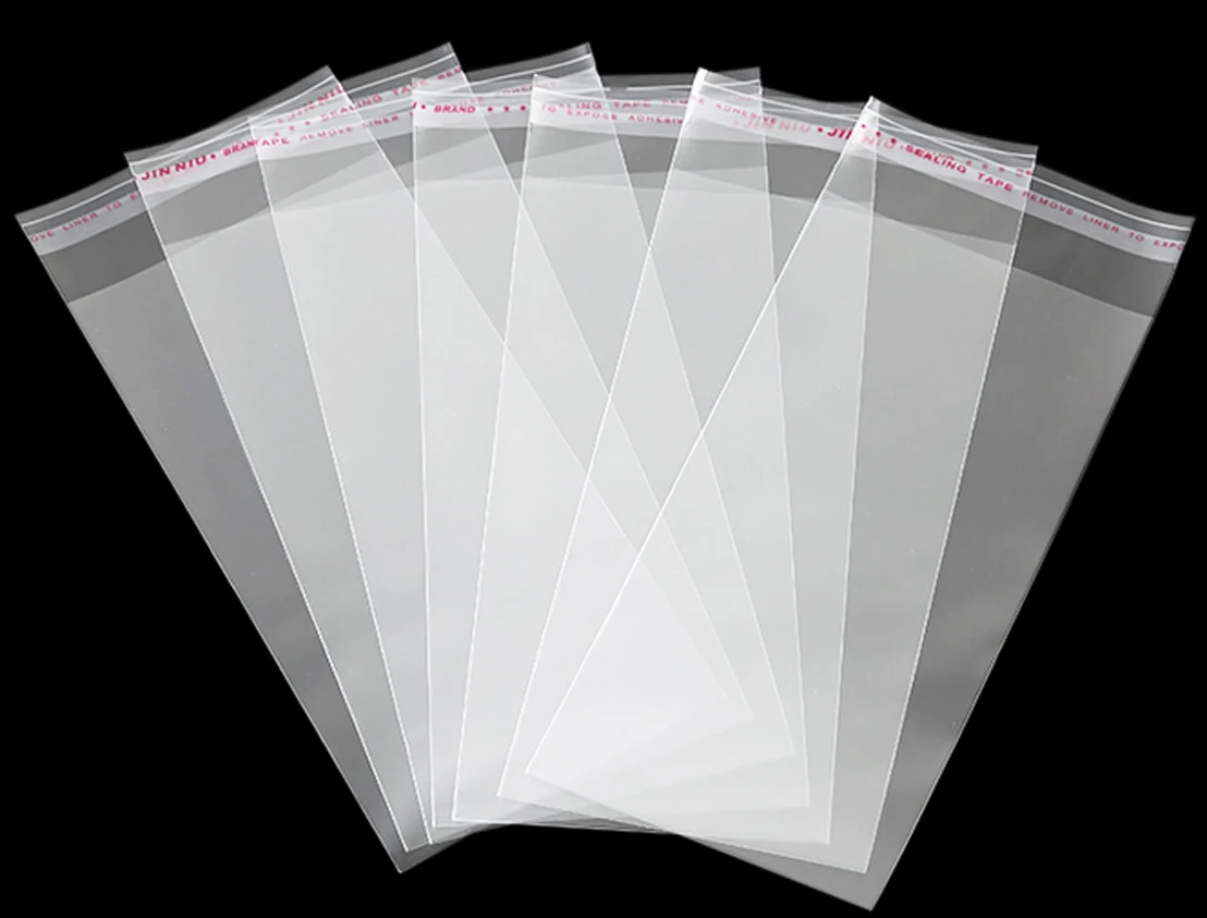 Fanned clear plastic resealable bags on black background