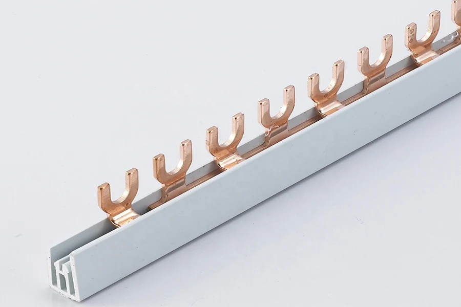 Pin-type and fork-type bus bar terminals laid out on a white background