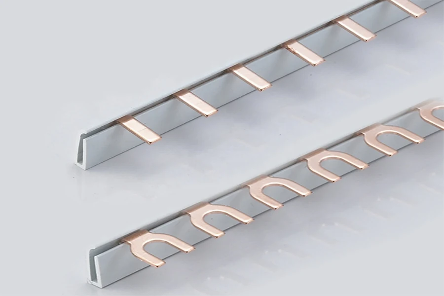 Close-up of a pin-type bus bar terminal connected to a copper busbar