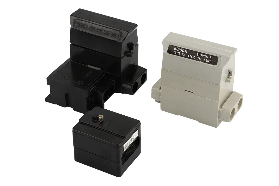 Cut out fuse with common body and interlocked components, showing loop in and loop out terminals